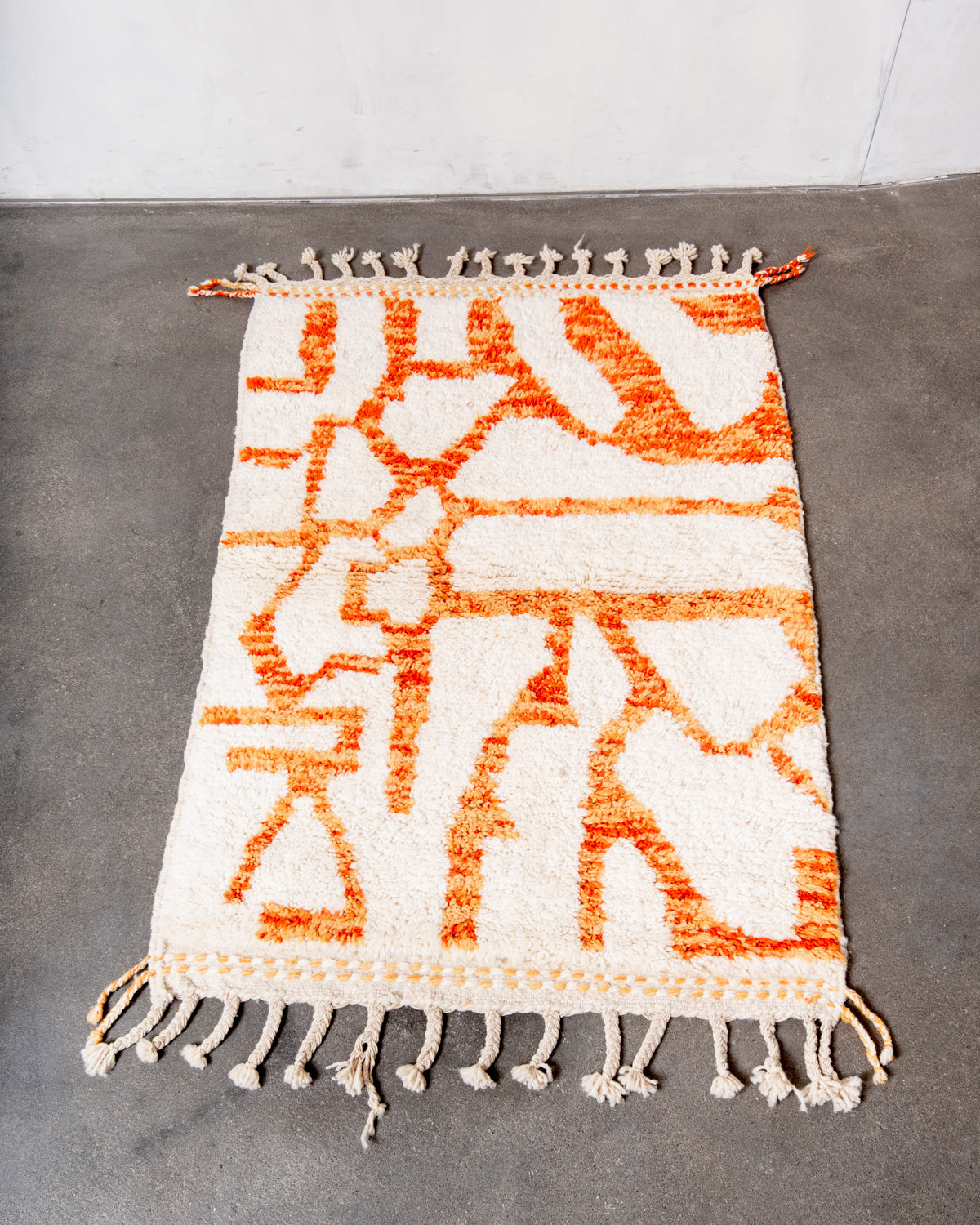 Modern, designer, handcrafted Berber rug from Morocco. Beniourain carpet with beautiful colours and patterns and fluffy wool texture.